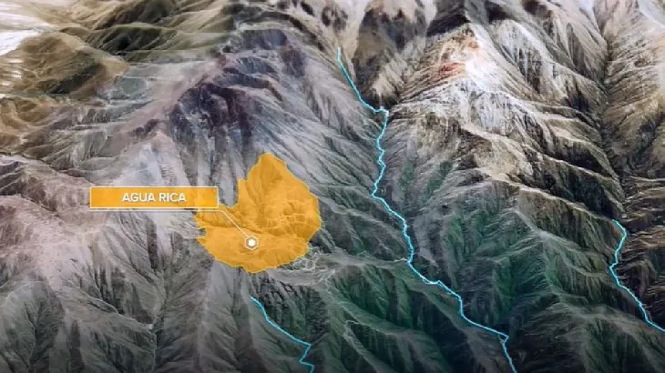 A map of mountains with a yellow circle Description automatically generated