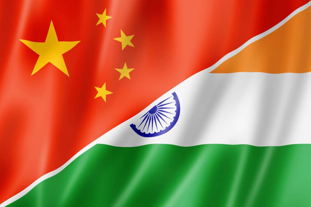 China and India flag, China and India to discuss carbon tax.