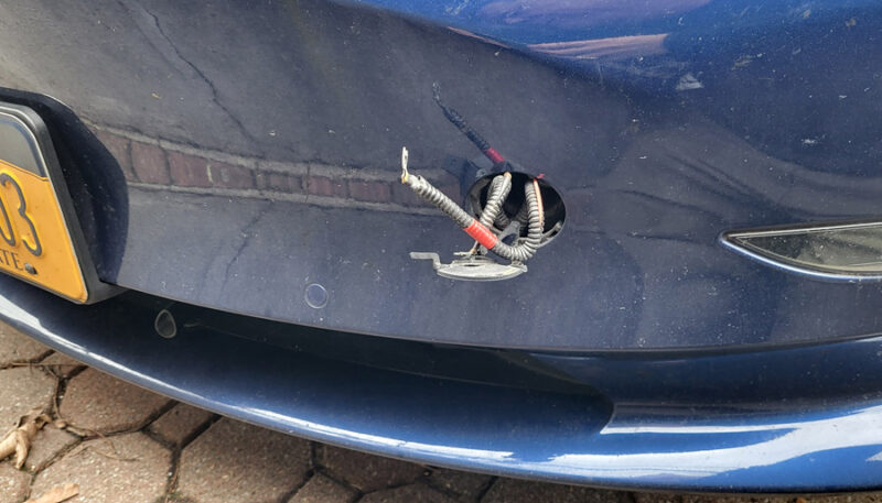 Tesla Model 3 Frunk Release wires exposed.