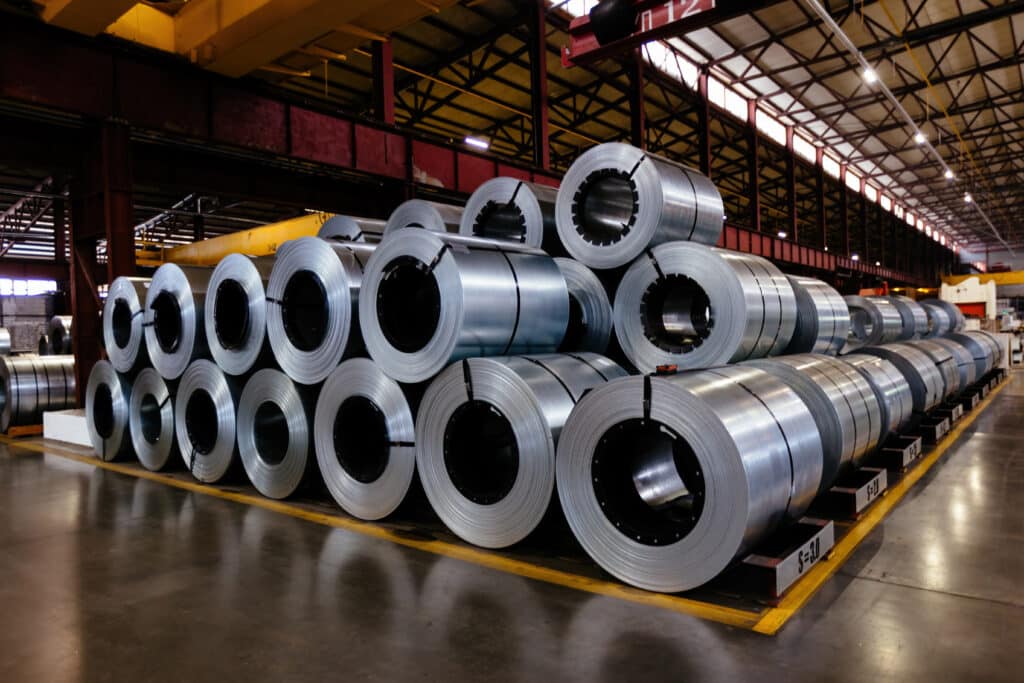 Rolls of galvanized steel sheet inside the factory or warehouse